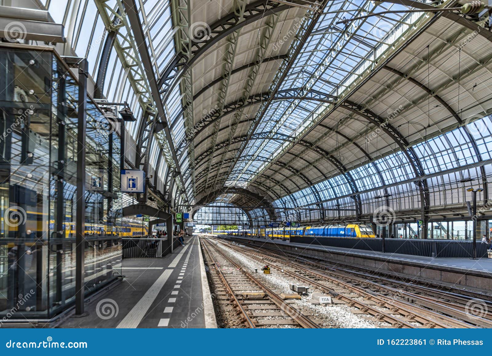 [Empty Amsterdam Train Station!](https://www.dreamstime.com/amsterdam-netherlands-view-empty-train-platform-ingenious-steel-construction-round-roof-rail-rails-upcoming-blue-image162223861)